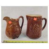 2- Old Brown Stoneware Pitchers (1 cracked)