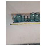 36" W Rack W/ 8- Blue Jars With Metal Lids