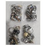 4 BAGS OF COSTUME RINGS