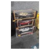 THREE 1/18 SCALE DIE CAST CARS