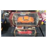 THREE 1/18 SCALE DIE CAST CARS