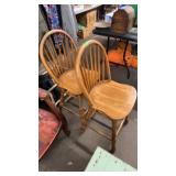 2 OAK SWIVEL BAR STOOLS