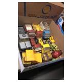 GROUP OF VINTAGE METAL TRUCKS & IMPLEMENTS