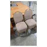 8 UPHOLSTERED STACKING CHAIRS