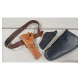 TWO HOLSTERS AND PISTOL CARRYING CASE