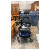 GOLDEN MOTORIZED WHEELCHAIR, WORKS GOOD