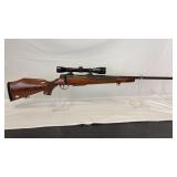 COLT SAUER 7MM  REM MAG W/ LEUPOLD SCOPE