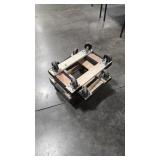 FOUR SMALL CARPETED MOVING DOLLIES