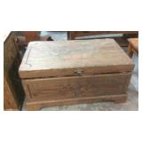 CARVED WOOD BLANKET CHEST  W/ DOLLS, BEDDING, ETC