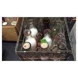 WIRE BASKET OF MILK BOTTLES