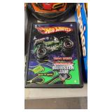 HOT WHEELS MOSTER TRUCKS CASE W/GRAVE DIGGERS