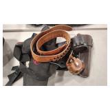 2 LEATHER AMMO BELTS AND 2 HOLSTERS
