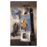 MOWER BLADE, SHARPENING STAND AND CRIMP RINGS