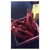 BASKET OF ORANGE EXTENSION CORDS