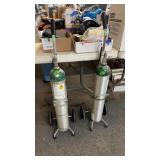 2 OXYGEN TANKS ON CARTS