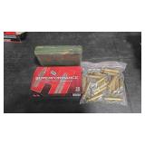 39 ROUNDS OF 7 MM REM MAG AMMO AND BRASS