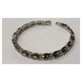 PERIDOT COLOR & CZ  ADJ BRACELET