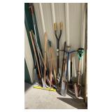 LARGE GROUP OF ASSORTED SHOVELS, RAKES AND POST HO