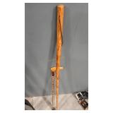 2 HAND CARVED WOOD WALKING STICKS