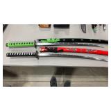 2 DECORATIVE SWORDS W/ SHEATHS
