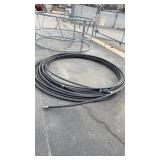 LARGE ROLL OF BLACK POLY PIPE