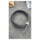 ROLL OF BLACK POLY PIPE