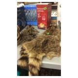 2 RACOON PELTS