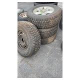 SET OF 4 WINTER CAT 245/70R16 STUDDED SNOW TIRES