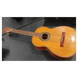 UNMARKED ACOUSTIC GUITAR