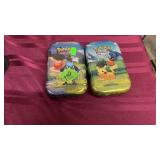 2 TINS OF POKEMON CARDS