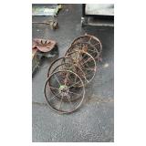 GROUP OF 7 IRON IMPLEMENT WHEELS