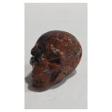 5.15 OZ PETRIFIED WOOD SKULL CARVING