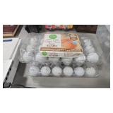 2 CONTAINERS OF GOLF BALLS