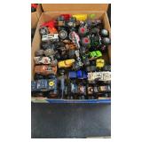 BX OF TOY MONSTER TRUCKS