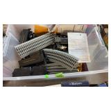 CLEAR TOTE OF TRAIN ITEMS