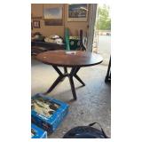 48' ROUND OAK TABLE