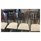 4 CHAIRS ON ROLLERS