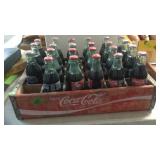 COCA COLA FLAT W/ FULL BOTTLES