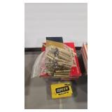 APPROX 130 375 H&H MAG BRASS AND 5 BULLETS
