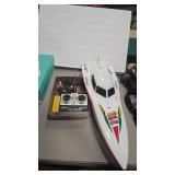 RC BOAT W/ CONTROLLER. BATTERY AND CHARGER