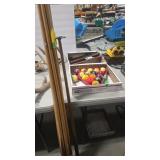 8 BILLIARD CUES, BILLIARD BALLS, CUE SHELVES AND