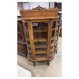 OAK ANTQ CURVED GLASS FRONT CURIO
