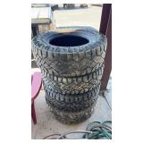 4- GOODYEAR WRANGLER LT265/70 R17 STUDDED TIRES