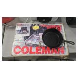 COLEMAN 2-BURNER PROPANE STOVE AND CAST IRON PAN