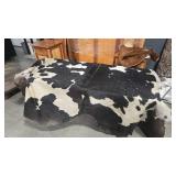 BLACK AND WHITE COWHIDE RUG