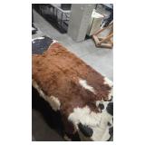 BROWN AND WHITE HEREFORD COWHIDE RUG