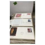 ALBUM OF FIRST DAY ISSUE POSTAGE STAMPS