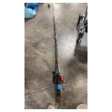 GROUP OF FISHING POLES AND REELS