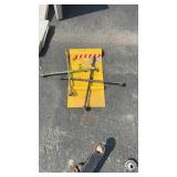 YELLOW WHEEL CHOCK & 2 STAR LUG WRENCHES