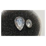 SYNTHETIC CLEAR STONES .5 CT &1.25CT